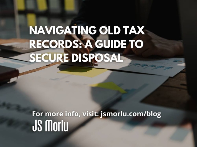 Close-up of accountant using calculator to manage household monthly budget efficiently - Tax Records